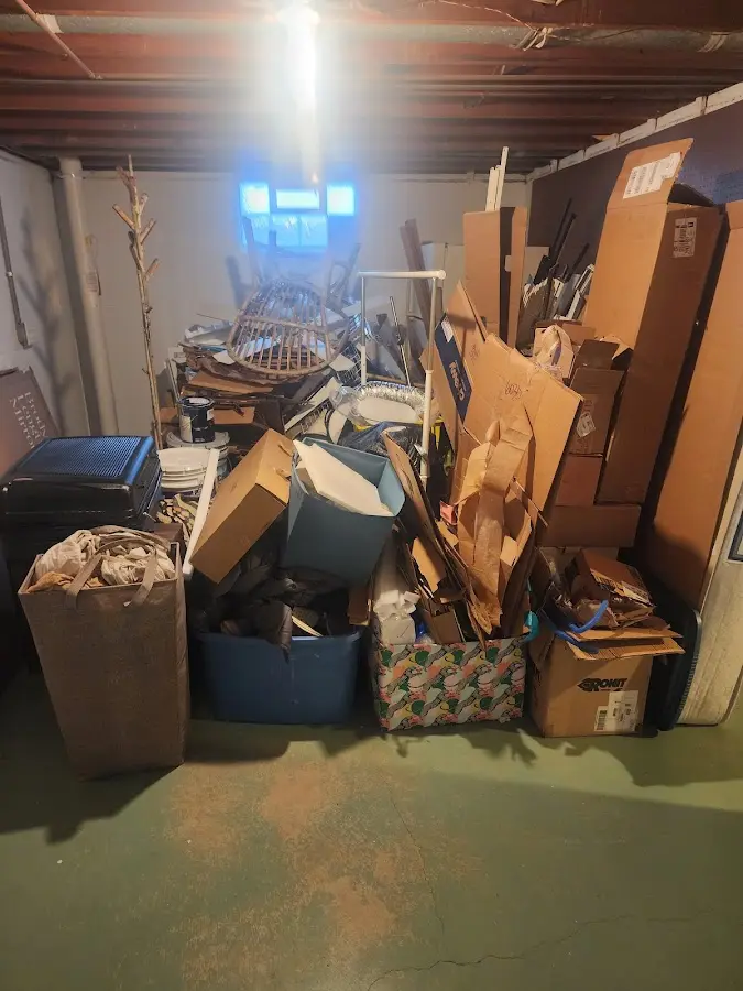 Roll-off dumpster container at job site for 6 Yard Dumpster Rental in Franklin